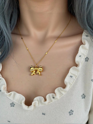 Golden Bow Pendant Necklace